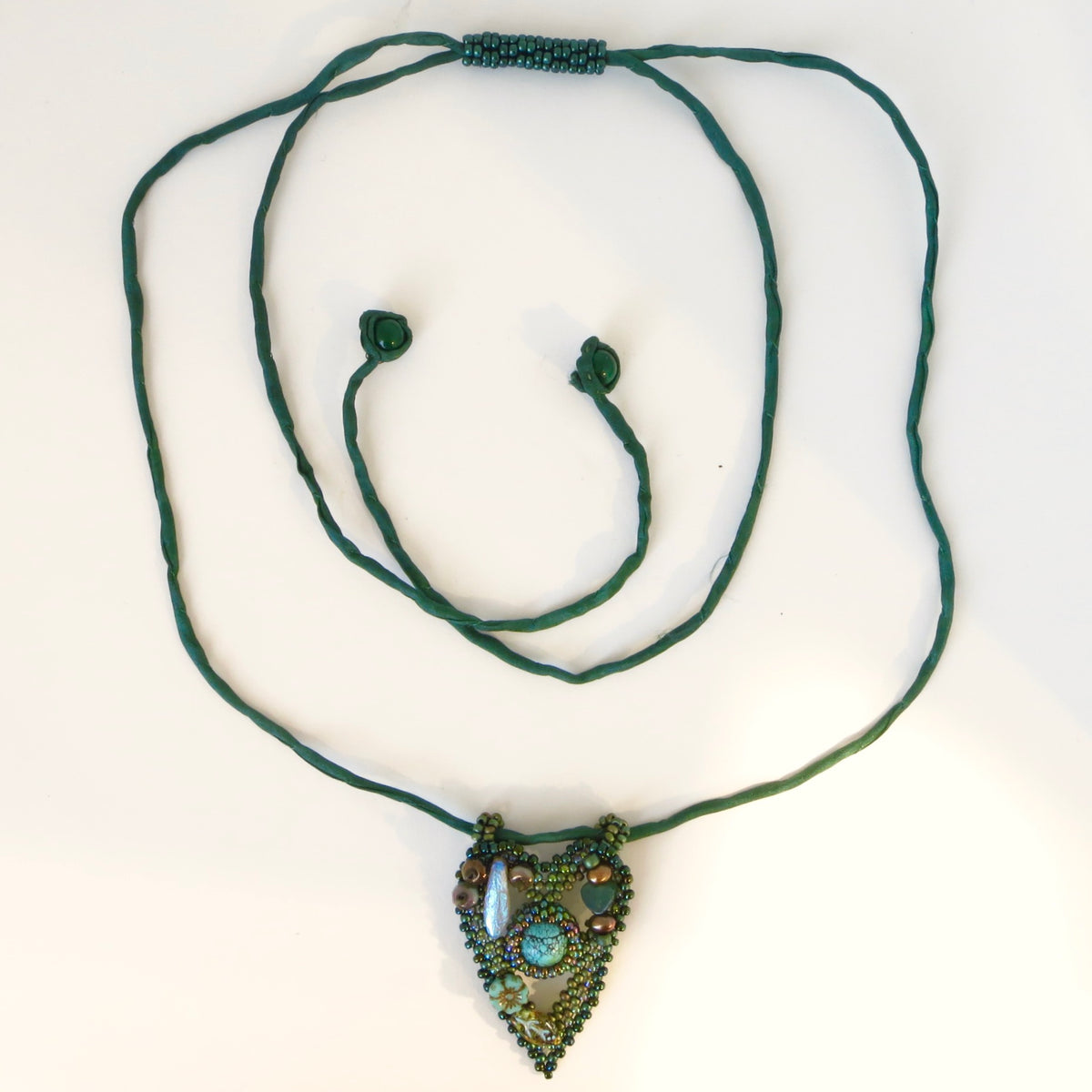 Mermaid Heart Pendants on Silk Cord